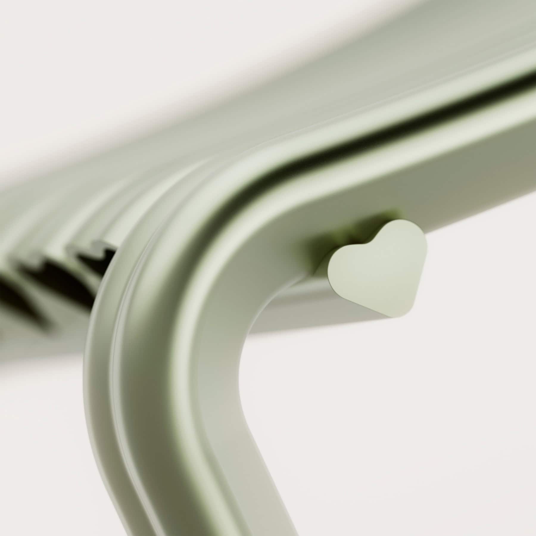 Heart-shaped aluminium profile in Spacon’s Close to Heart Chair for Muuto.