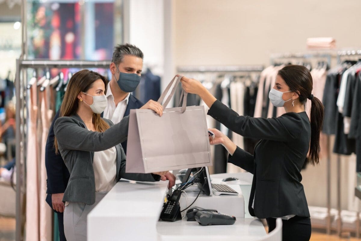 Couple shopping at a clothing store