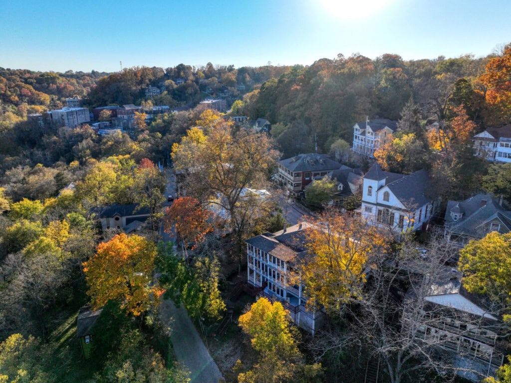 Fall colors in Downtown bring Crowds to enjoy live music at the Ozark Folk Festival in Basin Park, Eureka Springs, Arkansas.