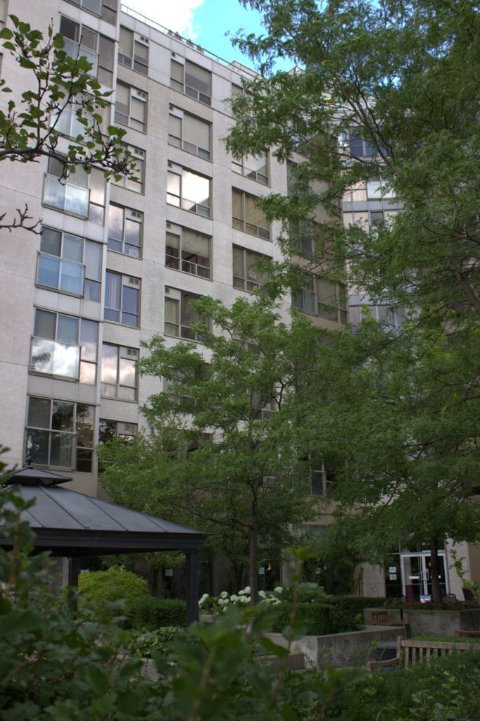 Side view of Two Neptune Drive overlooking the landscaped courtyard.