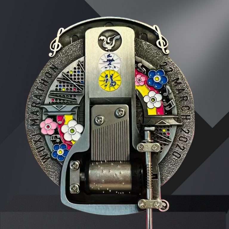 hand-shaken music box medal