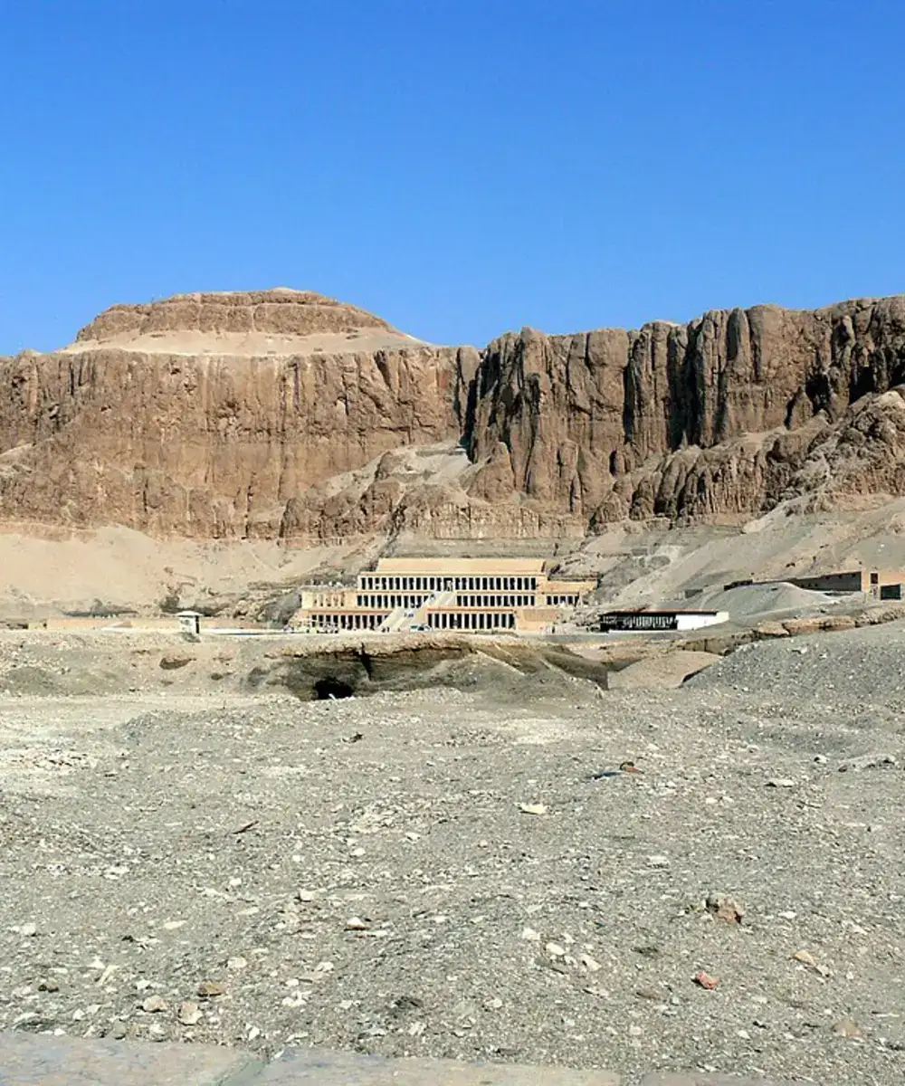Deir el-Bahari temple framed by limestone cliffs