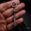 Indian agate feather earring, green gemstone and silver coloured feather on a small hoop