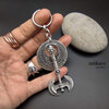 Minos, large earring with a round shield and double headed axe. Large hoop