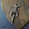 Silver moon earring with long spike and black Onyx gemstone. With small stainless steel hoop