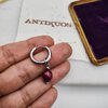 red pearl earring