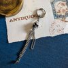 skull and chains mens earring