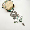 Intricate silver heart necklace with colourful beads.