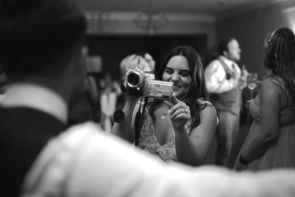 camcorder in use at a wedding