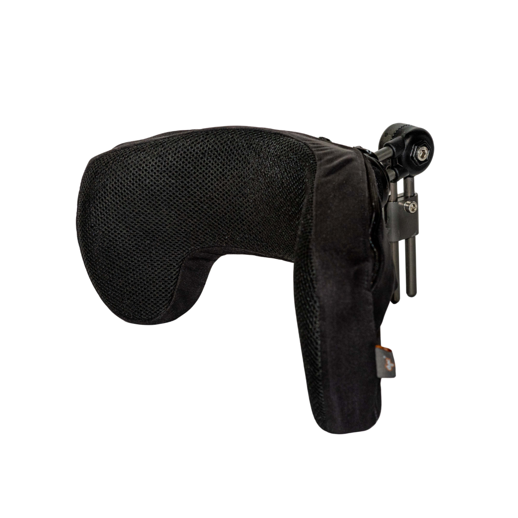 Winged contoured headrest for wheelchair providing postural support for children and adults
