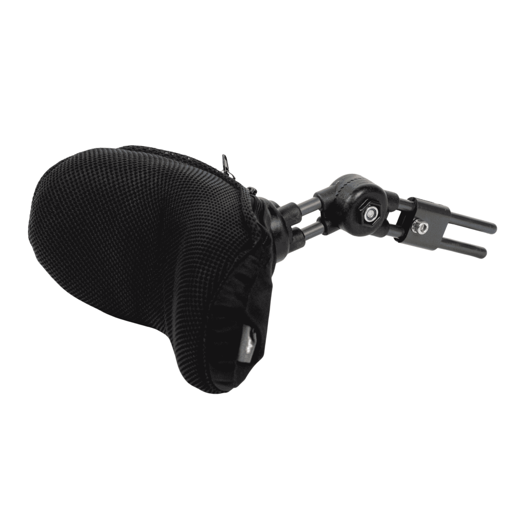 Contoured adjustable headrest for wheelchair providing postural support for children and adults