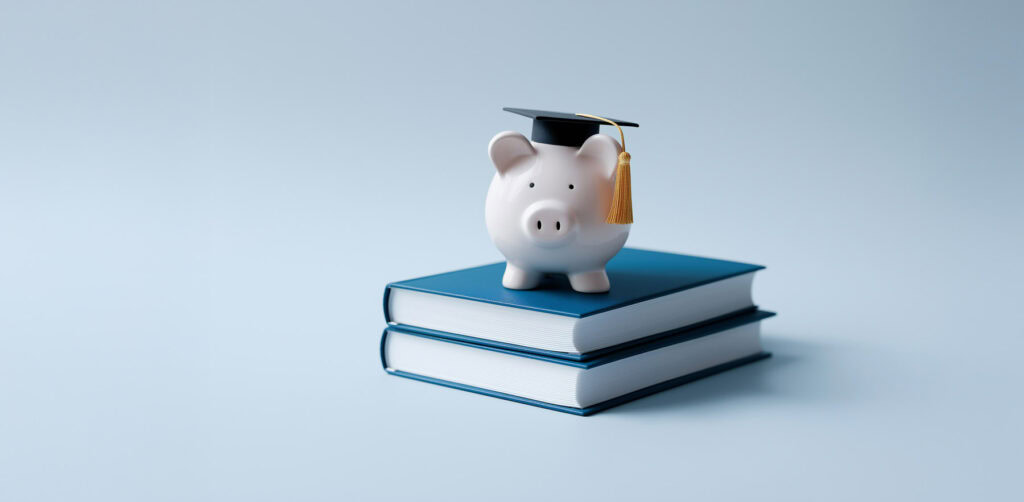 Deutschlandstipendium - Sparschwein mit akademischer Kopfbedeckung