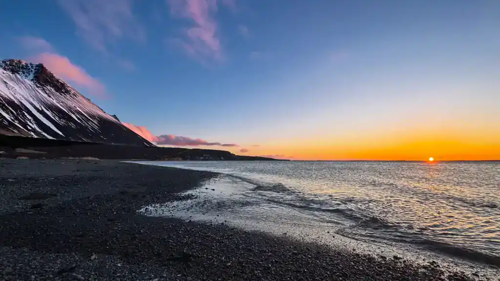 The beautiful sunset from the beach next to Hotel Hafnarfjall