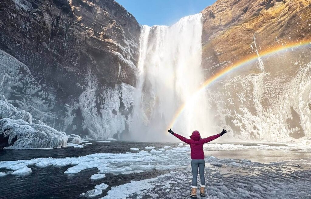 Skogafoss in winter surrounded by ice - one of the best waterfalls in Iceland