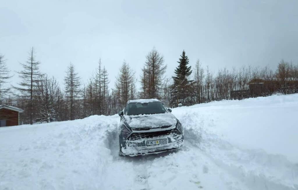 Our car in the morning after the snowstorm once we'd dug it out