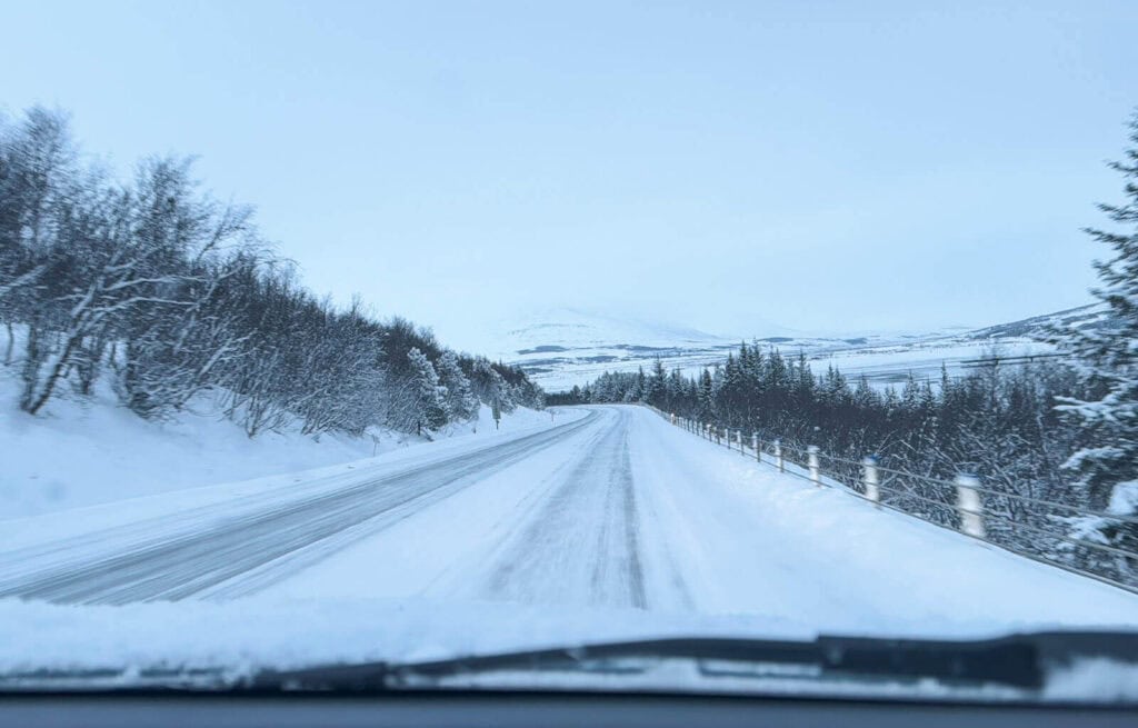 Wintery roads in Akureyri - a place you might go if you're driving in Iceland in winter