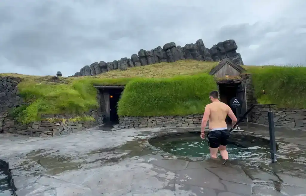 Andrew going into the cold plunge in the Sky Lagoon