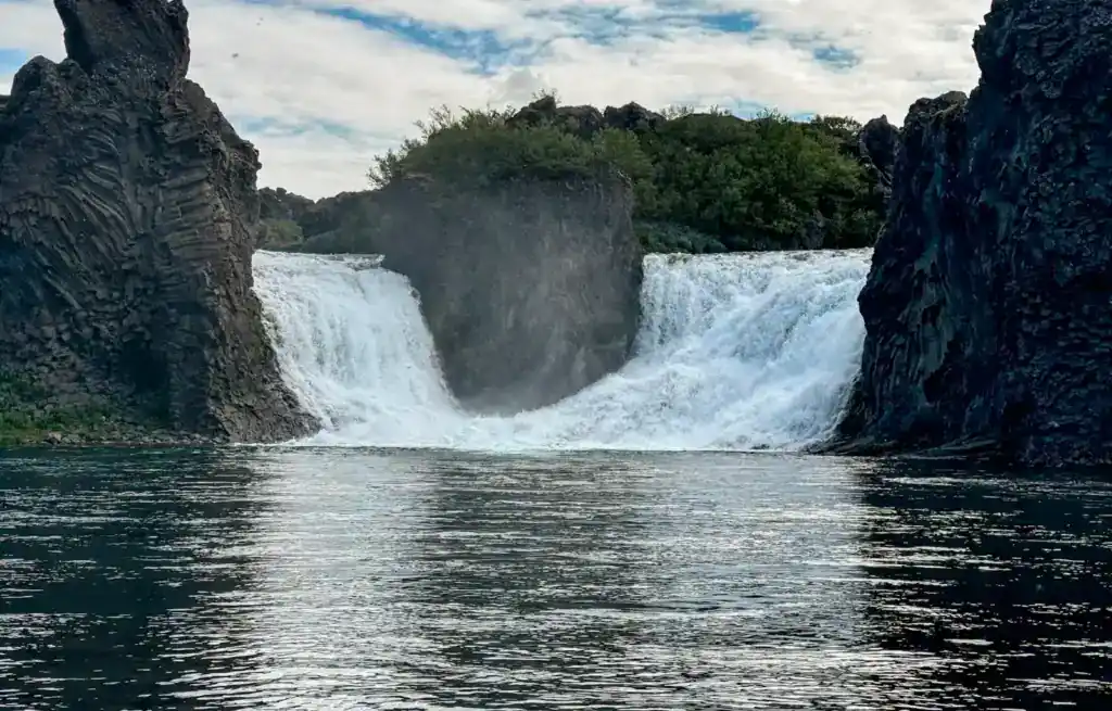 The pretty Hjalparfoss waterfall is well worth a visit in Iceland