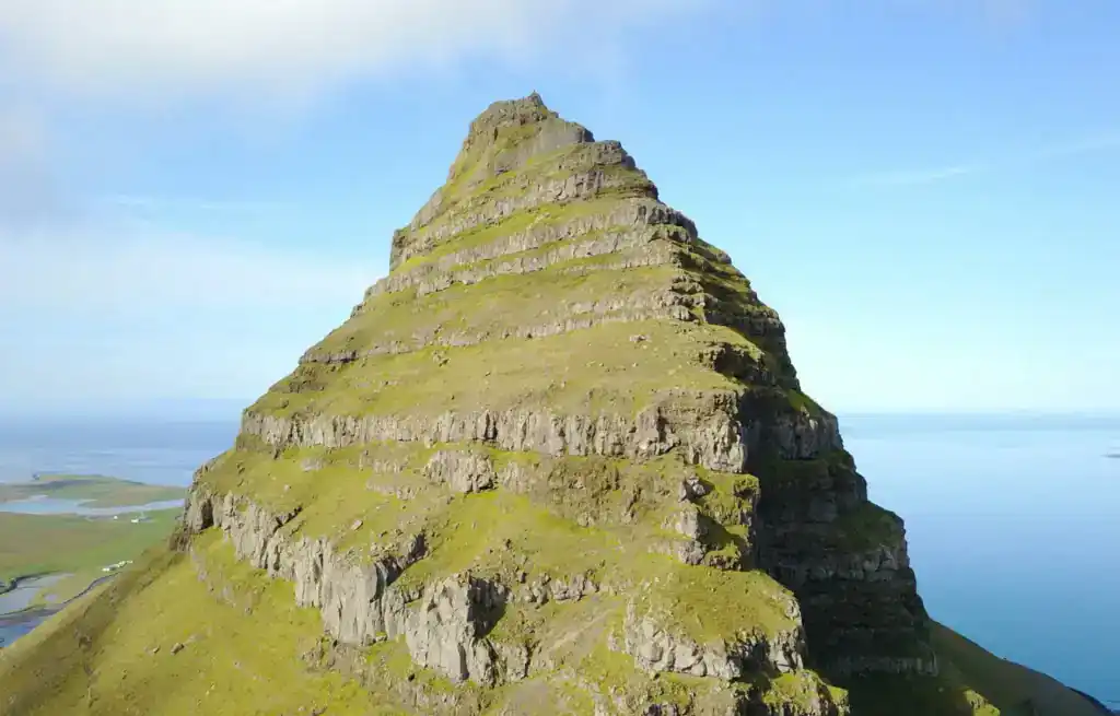 The unique cone-shape of Kirkufell Mountain - one of the trickiest hikes in Iceland