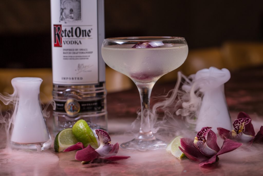 cocktail with ketel one vodka and dry ice.