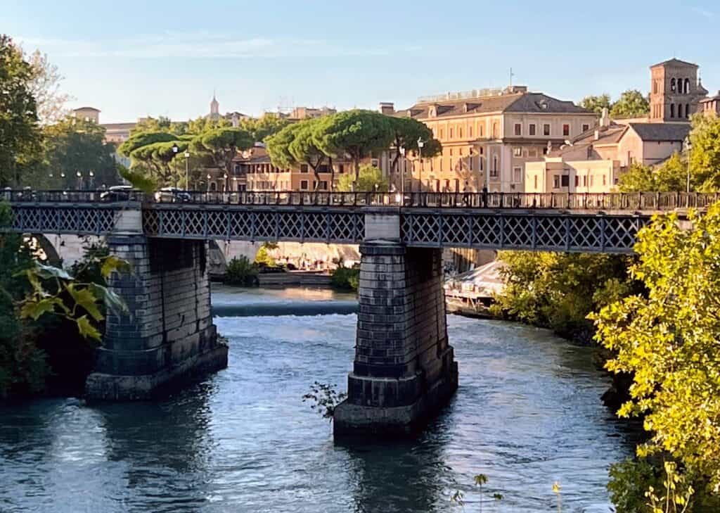 Rome Palatine Bridge Ponte Palatino Over Tiber River Buildings And Trees Early Evening Light