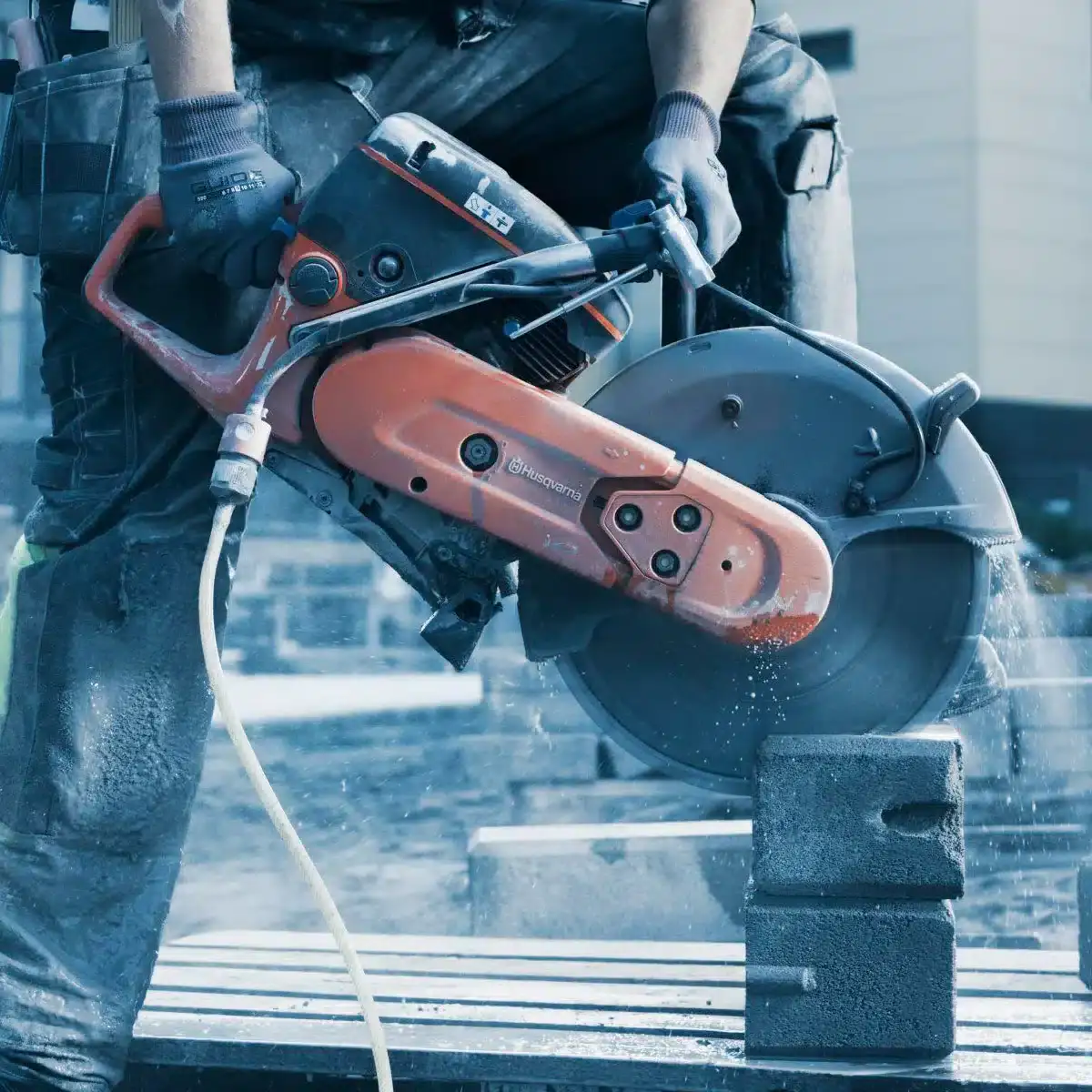 K770 14" POWER CUTTER being used to cut bars of iron/metal.