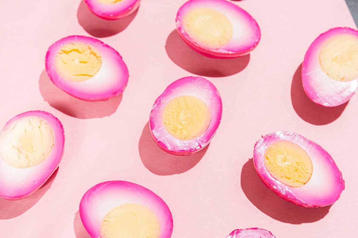 Sliced Pink Pickled Eggs with Beets
