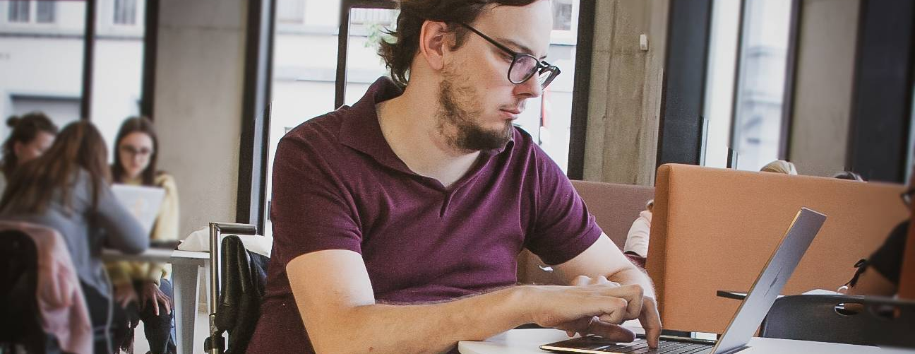 Photo of Steven Claeys working: True accessibility expert through life experience