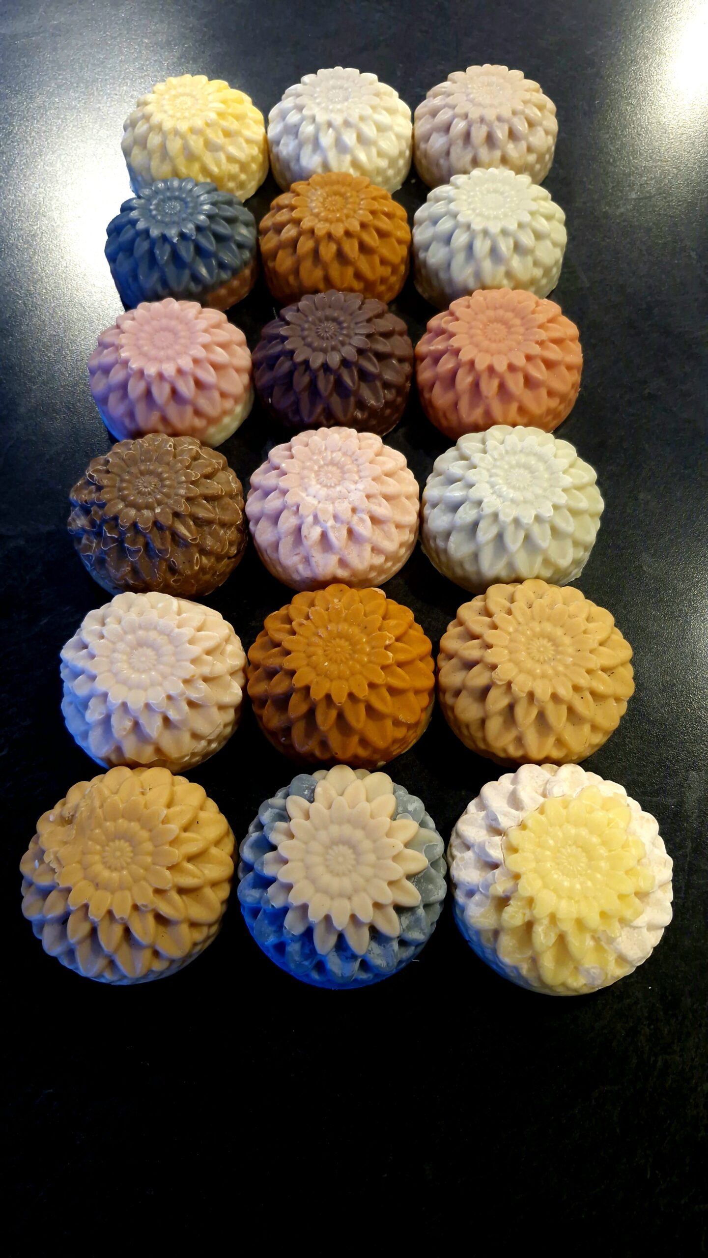Heart-shaped grass-fed tallow soap in yellow, cream and amber botanical shades, handmade by Fatglow