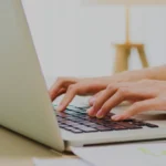 Accounting and tax tips for Canadian businesses Hands on laptop keyboard