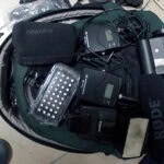 Voici ce que je mets dans le dessus de mon sac Lowepro.
