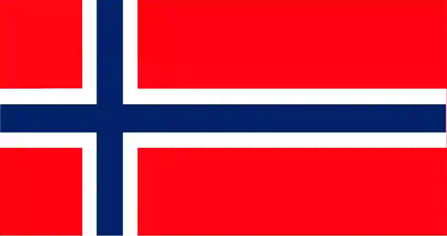 A flag of Norway featuring a red background with a dark blue Nordic cross outlined in white. The cross is shifted towards the hoist side, characteristic of Scandinavian flags. The flag is used on the Norway travel guide page, which is a page dedicated to all things Norway.