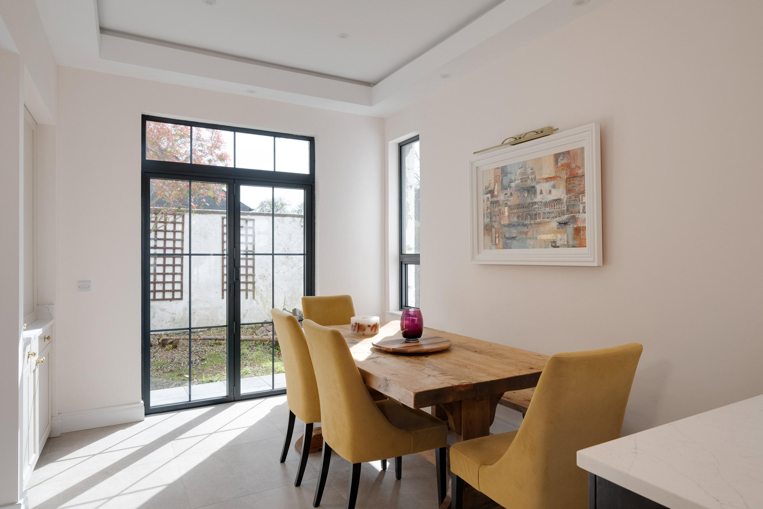 Light and airy open-plan kitchen and living room with high-spec finishes