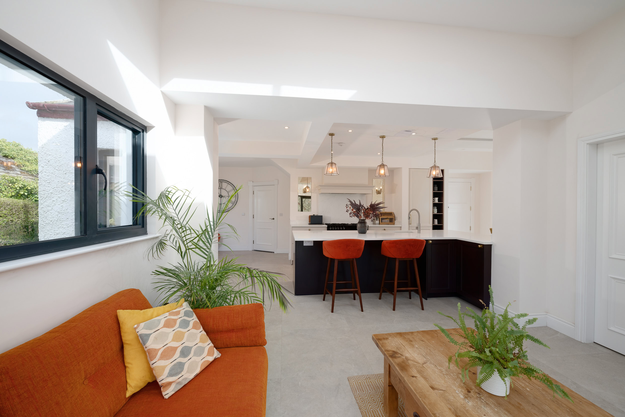 Light and airy open-plan kitchen and living room with high-spec finishes