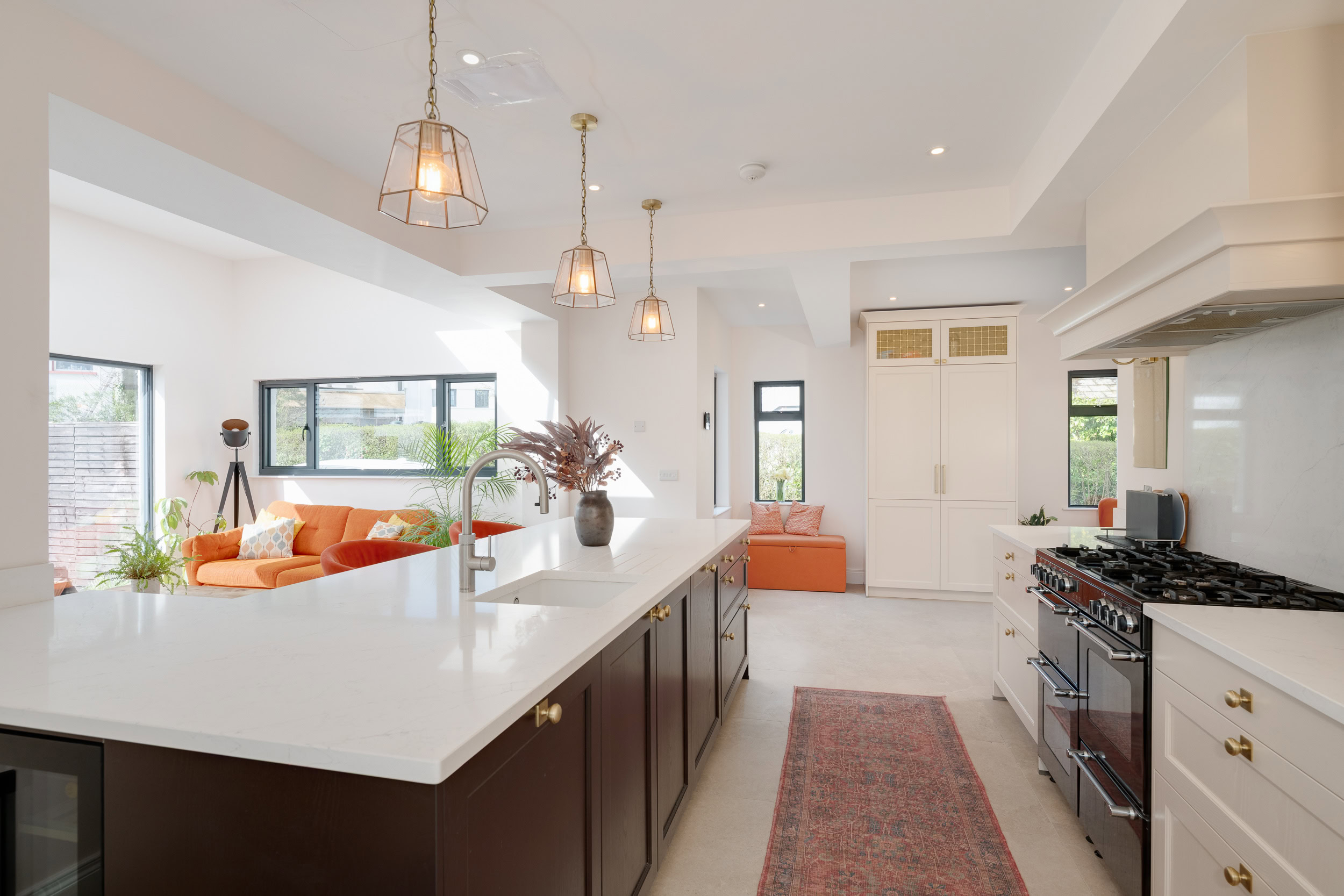 Light and airy open-plan kitchen and living room with high-spec finishes
