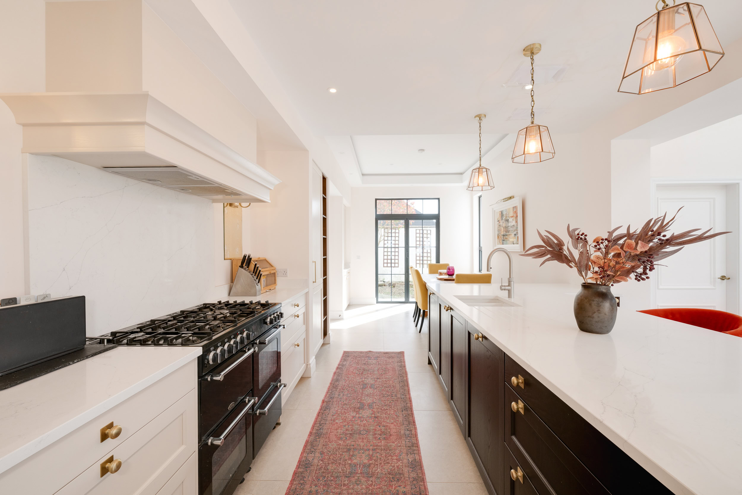 Light and airy open-plan kitchen and living room with high-spec finishes