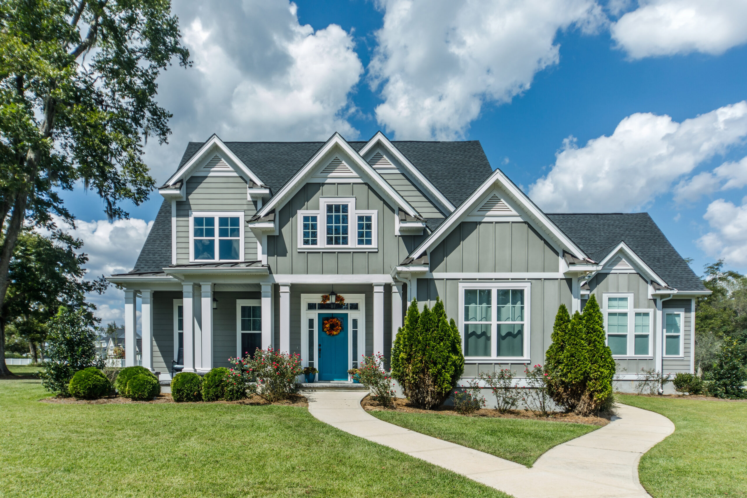 How Window Size and Placement Boost Home Value Gray New Construction Modern Cottage Home with Hardy Board Sidin
