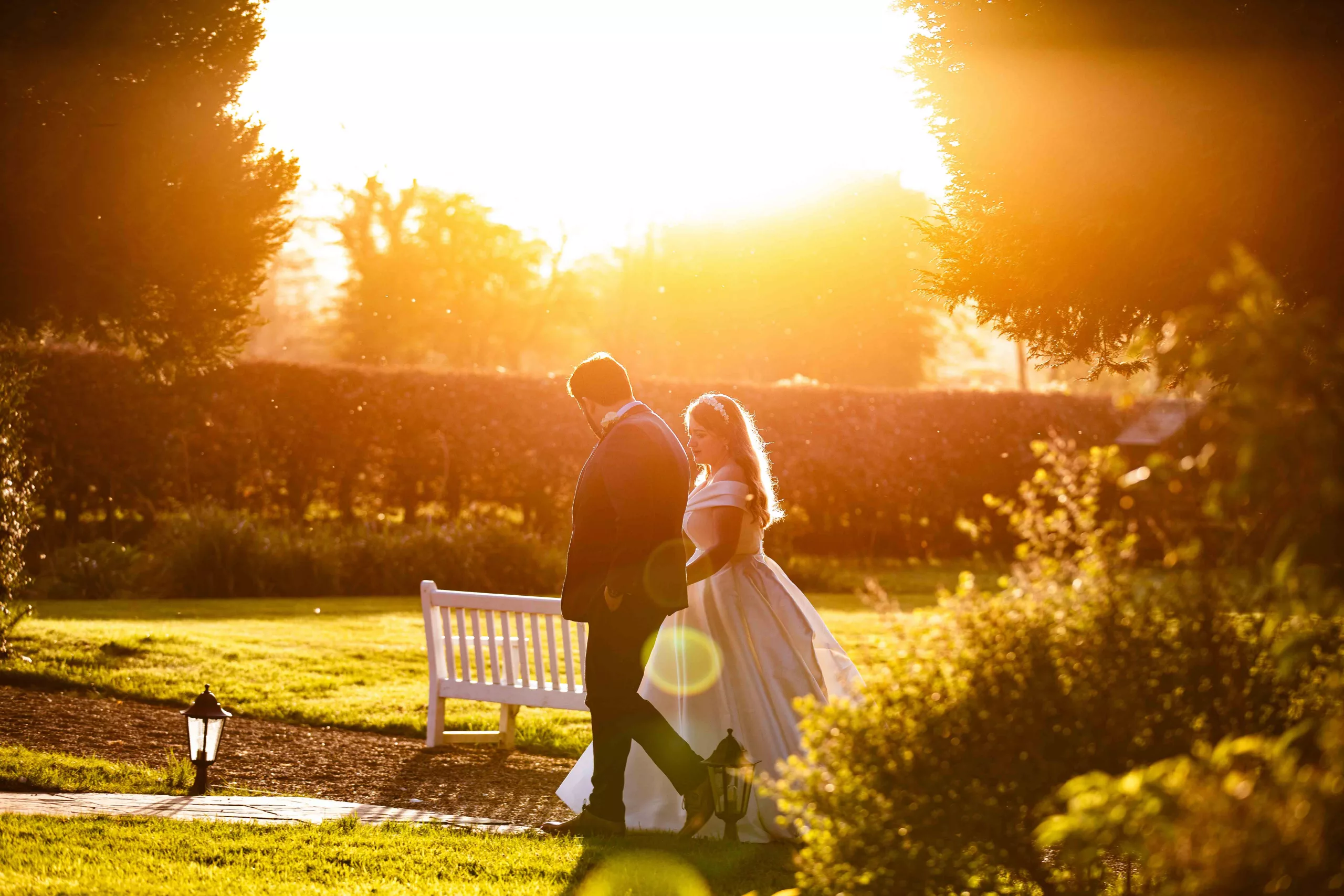 Wedding photograph of a couple at golden hour.