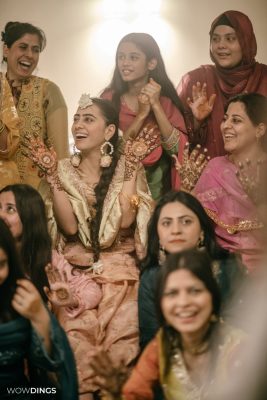 Muslim bride's with bridesmaid during a mehendi ceremony