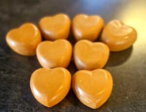 Small batch grass-fed tallow soap in winter colours including mustard, terracotta, grey and cream, handcrafted in Taranaki New Zealand