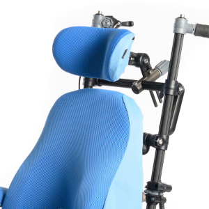 Contour adjustable headrest providing shaped lateral support and adjustable positioning on specialist seating chair