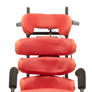 Winged contour headrest with lateral support wings designed to stabilise head positioning in specialist seating