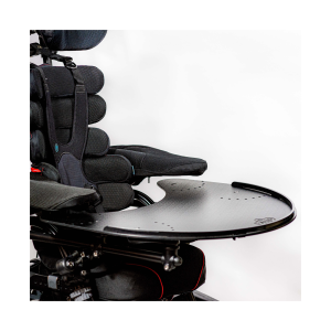 Activity tray accessory fitted to wheelchair providing a stable surface for eating, reading, and activities
