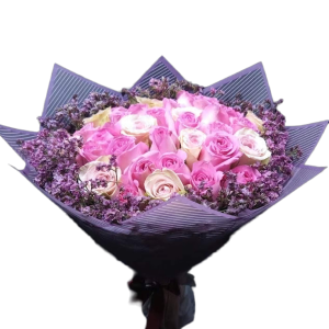 Special Love bouquet with baby pink and light pink roses, pink fillers, and purple boundary flowers arranged by Nectar Flower Shop Nairobi.