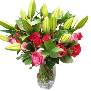 Vase Smile Bouquet with lilies, red roses, and aruscus in a clear glass vase – fresh flower arrangement for same-day delivery in Nairobi.