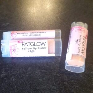 Fatglow Rose and Alkanet infused grass-fed tallow lip balm — a soothing anti-inflammatory botanical lip treatment handmade in New Zealand