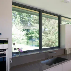 smart alitherm aluminium window above kitchen sink overlooking garden