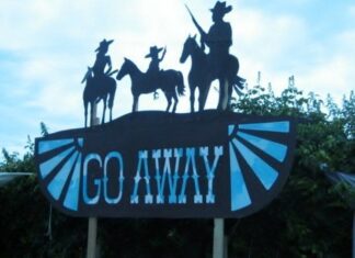 Cornwall, England. Go Away Sign