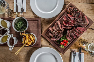 food photograph of steak chips and sauces