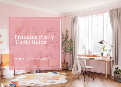 Soft Pink Home Office Scene With Modern Decor, Large Window, And White Desk, Overlaid With Text That Reads Printable Pretty Studio Guide — Printablepretty.com